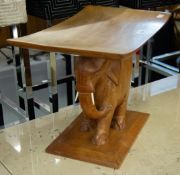 A WOODEN CARVED ELEPHANT SEAT/STOOL