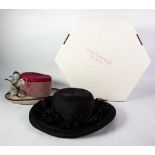 SUZY KRAKOWSKI, MILLINERY, TWO LADY'S HATS, one wine red and drum-shaped with broad white rim with
