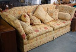 LARGE KNOLL STYLE DOUBLE DROP-END SOFA, GOLD AND RED FLORAL FABRIC, WITH MATCHING SCATTER CUSHIONS