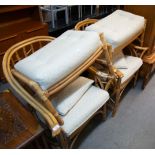 A PAIR A BAMBOO ARMCHAIRS WITH TWO RECTANGULAR MATCHING STOOLS