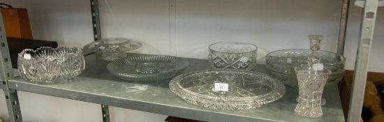 A SELECTION OF CUT GLASS AND FOUR MOULDED GLASS DIVIDED SERVING PLATES, VARIOUS SIZES, SMALL VASE