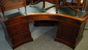 LARGE MAHOGANY LEATHER-INLAID CORNER DESK, HAVING GREEN LEATHER INSET TOP, TWO PEDESTALS ONE WITH