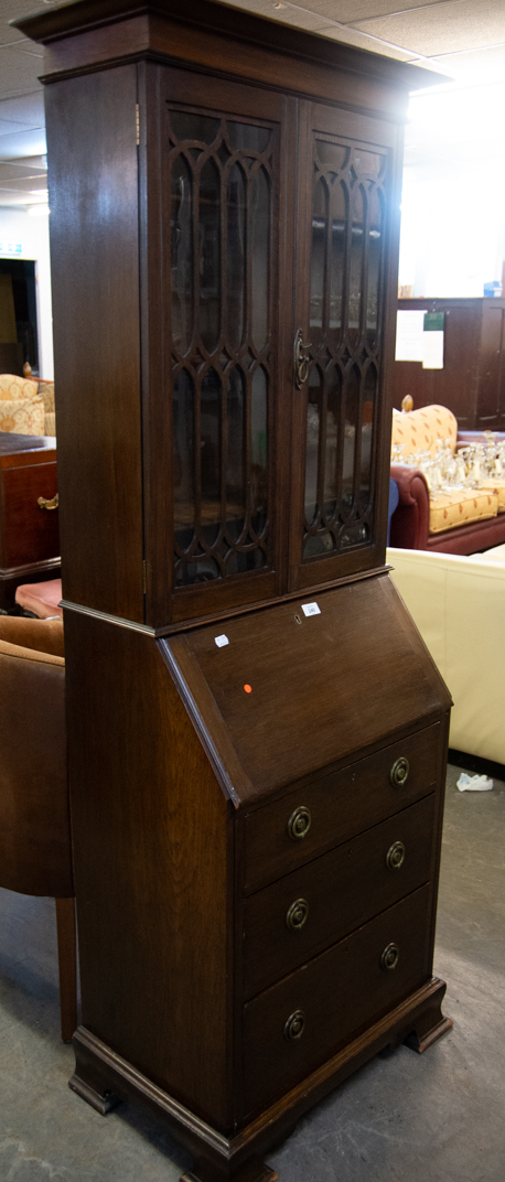 ARTS AND CRAFTS OAK BUREAU BOOKCASE, GLAZED DOR AND THREE DRAWERS