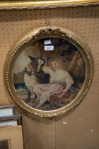 VICTORIAN OVAL CHENILLE TAPESTRY PICTURE OF A GIRL AND A GOAT, contained in the original gilt