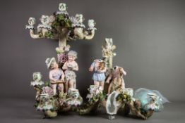 ERNST BOHNE & SOHNE, PAIR OF NINETEENTH CENTURY FIGURAL SEVEN LIGHT ENCRUSTED PORCELAIN CANDELABRAS,