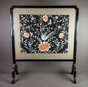 TWENTIETH CENTURY ORIENTAL EBONISED FIRESCREEN WITH NEEDLEWORK PANEL, the screen of typical form