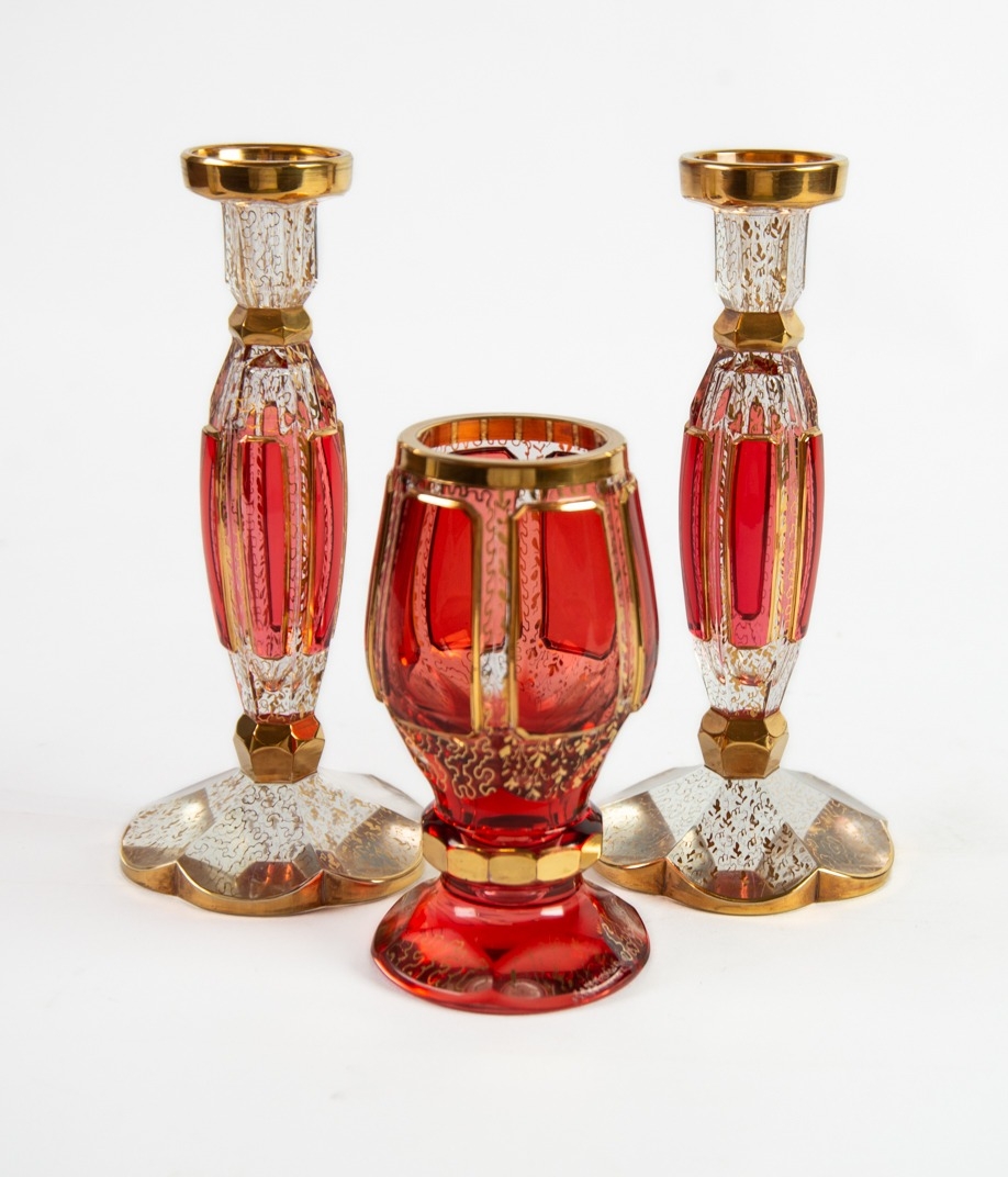 PAIR OF MURANO RUBY GLASS AND GILT CANDLESTICKS, 7” (17.8cm) high, together with a SIMILAR FIRING