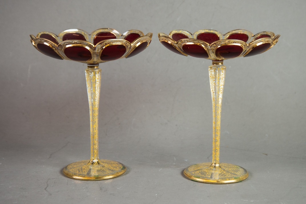 PAIR OF BOHEMIAN RUBY OVERLAID AND GILT ETCHED PETAL PATTERN CIRCULAR DISHES, on tall tapering - Image 2 of 6