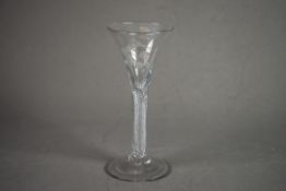 ANTIQUE AIRTWIST AND CRESTED GLASS, with flared bowl, multiple spiral air twist stem and conical