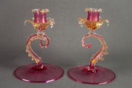 PAIR OF MURANO PINK AND AVENTURINE GLASS CANDLE HOLDERS, each modelled as a scrolled leaf supporting