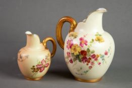 ROYAL WORCESTER BLUSH CHINA JUG, with gilt moulded loop handle, painted with flowers, date code