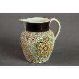 VICTORIAN GRAVELWARE PEARLWARE POTTERY JUG, decorated in colours with stylised flowerheads beneath a