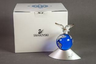 BOXED SWAROVSKI ‘CRYSTAL PLANET VISION 2000’ GLASS AND METAL SCULPTURE, with certificate, ¾” (