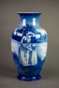 ROYAL DOULTON BLUE AND WHITE POTTERY VASE, of footed ovoid form with waisted neck, decorated with