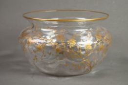 A LARGE CONTINENTAL BLOWN GLASS OVULAR BOWL with embossed gilt decoration of delicate foliate and