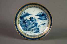 NINETEENTH CENTURY CHINESE BLUE AND WHITE PORCELAIN SAUCER DISH, painted with dwellings, trees and