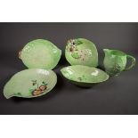 FIVE PIECES OF CARLTON WARE GREEN GLAZED MOULDED POTTERY WITH FLORAL DECORATION, comprising: