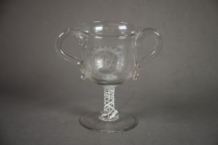 ANTIQUE OPAQUE TWIST TWO HANDLED GLASS LOVING CUP, of typical form with scroll handles, the stem