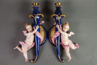 PAIR OF CAPO DIMONTE FIGURAL POTTERY WALL SCONCES SIGNED BELLAIRE, each painted in colours and