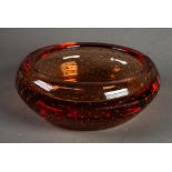 CIRCA 1960's MURANO APRICOT TINTED GLASS SHALLOW BOWL with turned-over rim, enclosing multiple AIR