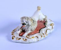 NINETEENTH CENTURY STAFFORDSHIRE PORCELAIN MODEL OF A CLIPPED POODLE, modelled with raised back