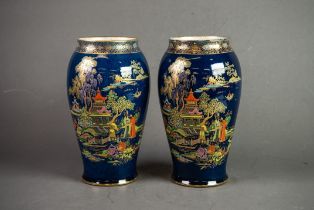 PAIR OF CROWN DEVON CHINOISERIE LUSTRE DECORATED BALUSTER VASES, with figures and pagodas on