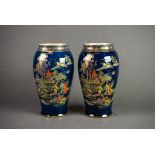 PAIR OF CROWN DEVON CHINOISERIE LUSTRE DECORATED BALUSTER VASES, with figures and pagodas on