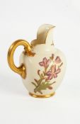 LATE VICTORIAN ROYAL WORCESTER BLUSH CHINA EWER, of footed ovoid form with cut out spout and moulded