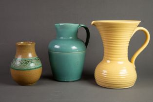 LOVATTS YELLOW GLAZED LARGE JUG, of ribbed form with flared rim, 9 ¾” (24.8cm) high, together with a