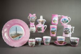 TWENTY EIGHT PIECES OF ‘MADE IN GERMANY’ BRITISH SOUVENIR PORCELAIN WITH PINK GROUNDS, including