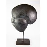 MODERN BLACK TEXTURED RESIN HEAD SCULPTURE, modelled in profile with black stained wood oblong base,