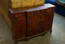 NINETEENTH CENTURY BREAKFRONT HALL CABINET WITH BRUSHING SLIDE AND BRACKET FEET OF SMALL PROPORTIONS