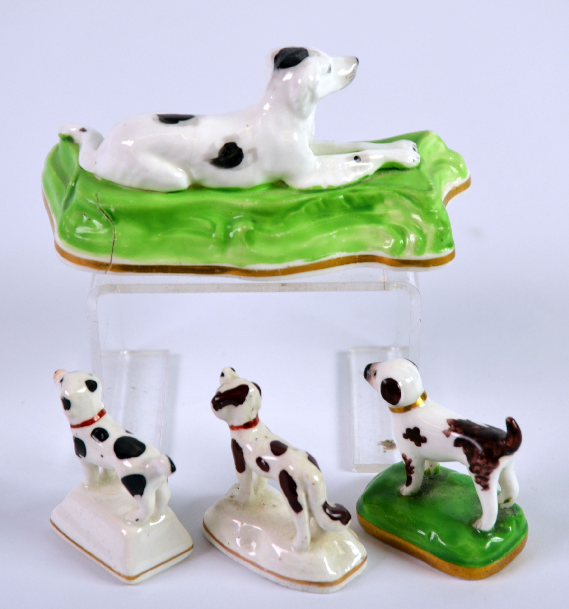 FOUR NINETEENTH CENTURY STAFFORDSHIRE PORCELAIN MODELS OF DOGS, comprising: THREE SMALL STANDING - Image 2 of 2