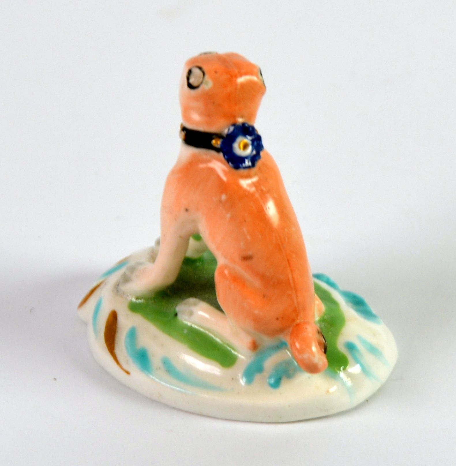 NINETEENTH CENTURY DERBY PORCELAIN MODEL OF A SEATED PUG, painted in colours and gilt, on a - Image 2 of 2