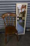 AN OAK SPINDLE-BACK COUNTRY DINING CHAIR, AND AN OBLONG ROBING MIRROR (2)