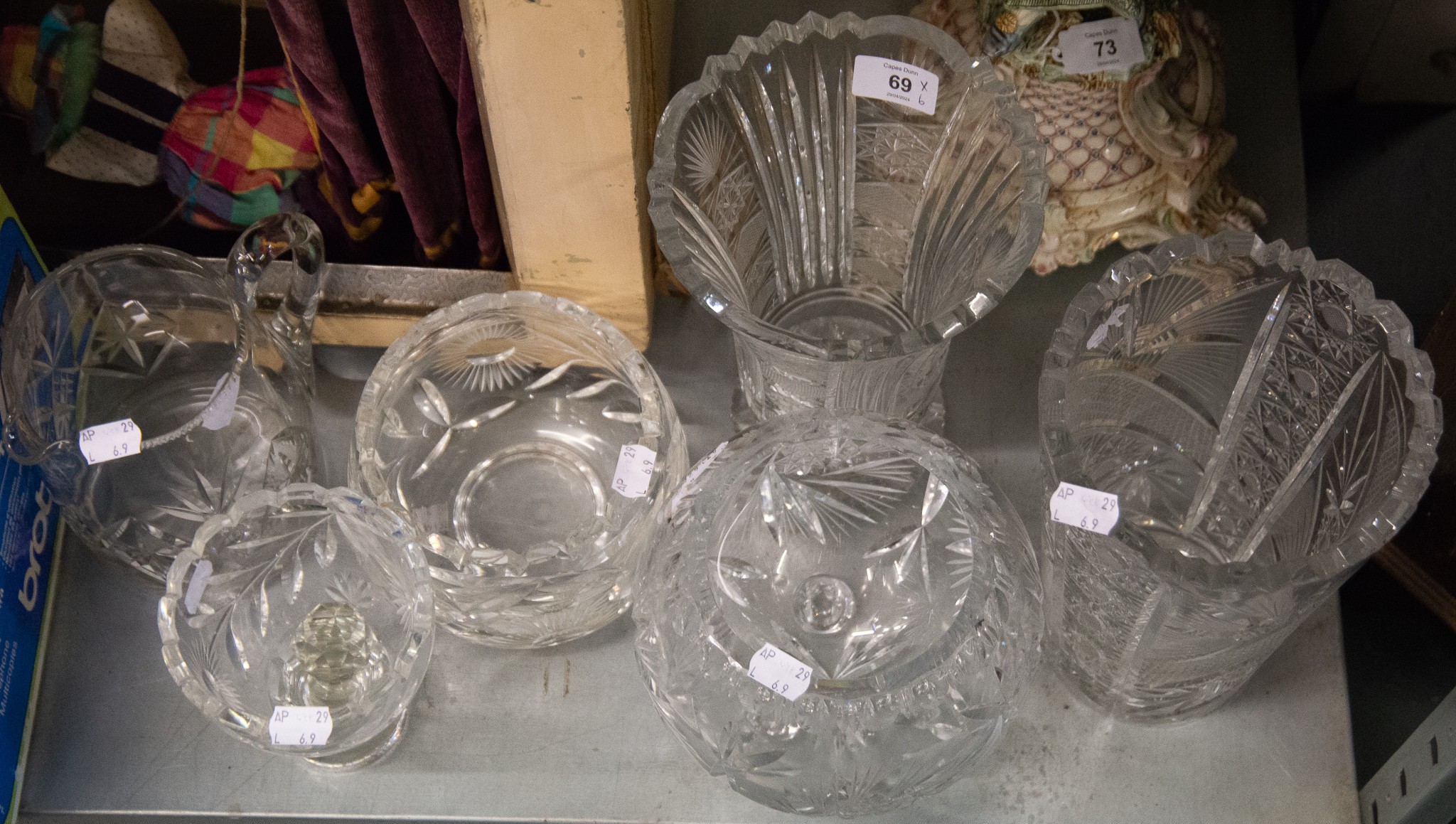 TWO LARGE BOHEMIAN LEAD CRYSTAL VASES; TOGETHER WITH A GLOBE VASE TWO SMALLER EXAMPLES AND A WATER
