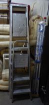 A LARGE SET OF ALUMINIUM STEP LADDER, A SMALLER PAIR AND A ROTARY CLOTHES AIRER (AS NEW) (3)