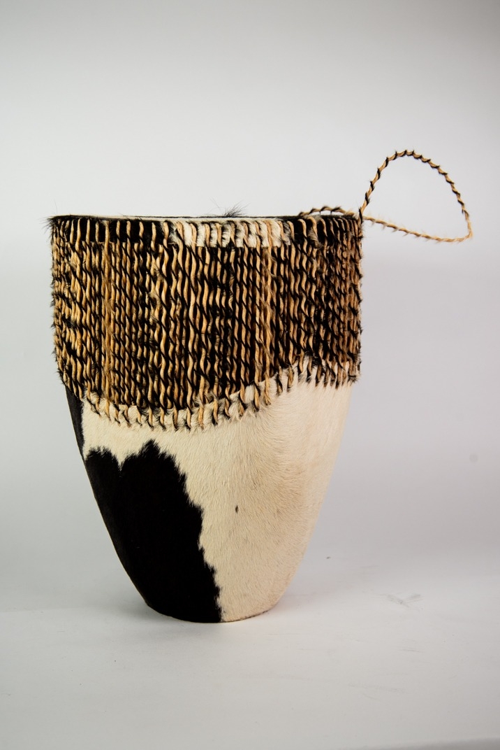 MODERN BLACK AND WHITE COWSKIN COVERED HAND DRUM, of typical form with loop handle, 15 ½” (39.3cm) - Image 2 of 2