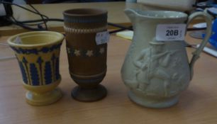 EDWARD WALLY AND SONS, PALE GREEN DRAB WARE JUG, EMBOSSED WITH A SPORTSMAN DUCK SHOOTING, CIRCA