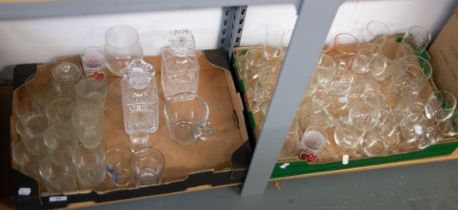 A PAIR OF CUT GLASS SQUARE SPIRIT DECANTERS AND A QUANTITY OF PLAIN STEM WINE GLASSES AND TUMBLERS