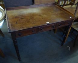 19TH CENTURY MAHOGANY WRITING OR DRESSING TABLE WITH LOW THREE QUARTER GALLERY, ROW OF THREE SHORT