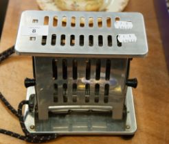 A VINTAGE CHROME TOASTER