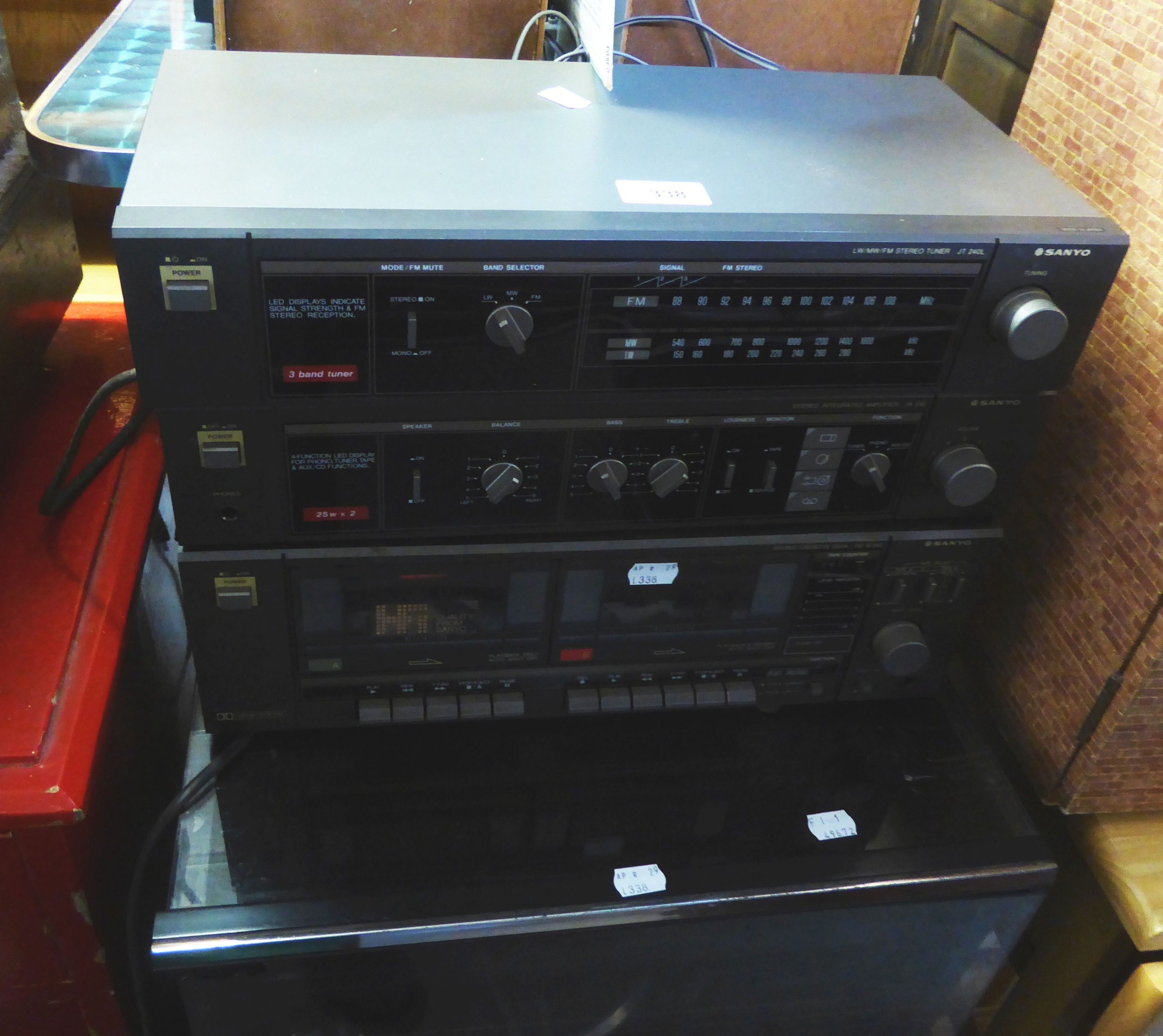 SANYO STACKING STEREO SYSTEM IN GLAZED STEREO CABINET AND A PAIR OF SPEAKERS AND AKAI CD PLAYER (2)