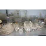 A CUT GLASS SHIPS DECANTER, A SET OF TEN CUT GLASS SUNDAE DISHES, A LARGE CUT GLASS BISCUIT