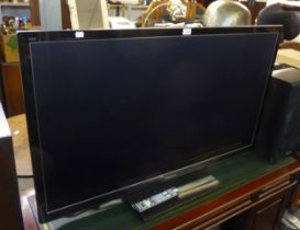 A PANASONIC VIERA 50" TV WITH REMOTE CONTROL, MODEL No. TX-P50GT30B