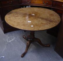 A GEORGE II OAK SNAP-TOP BREAKFAST TABLE ON PEDESTAL BASE