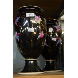 PAIR OF LATE 19th CENTURY CONTINENTAL PORCELAIN VASES, the black glazed ground colourfully enamelled