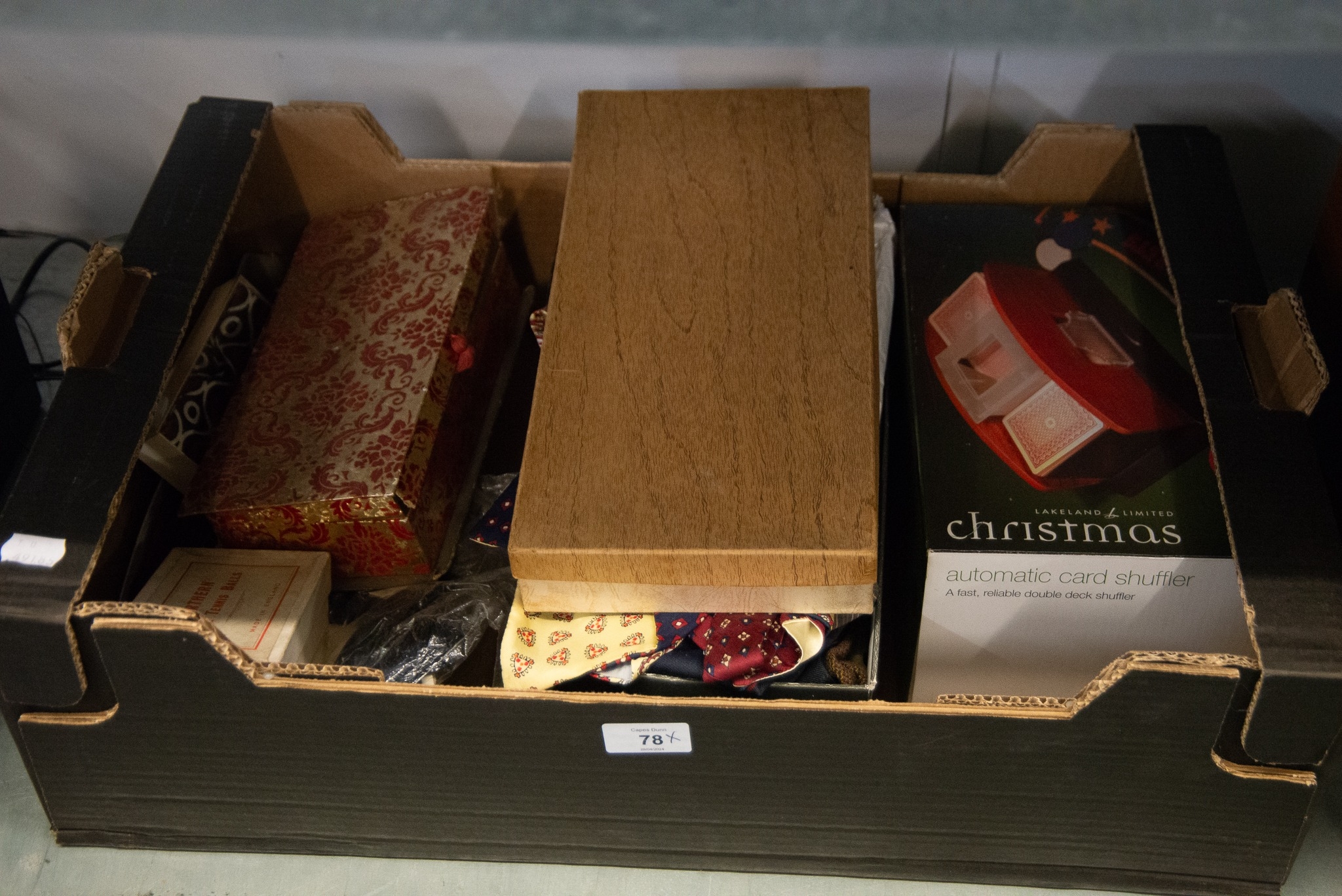 A GOOD SELECTION OF SILK TIES AND VARIOUS BOARD AND CARD GAMES