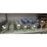 A SELECTION OF WINE GLASSES AND FLUTES, TOGETHER WITH BRANDY GLASSES (APPROX 44 PIECES)