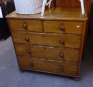 A VICTORIAN PINE CHEST OF TWO SHORT OVER THREE LONG DRAWERS, RAISED ON TURNED FEET (A.F.)